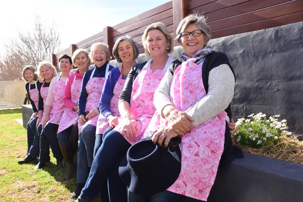 Rosy event: Dubbo Pink and White Committee for Guide Dogs NSW/ACT members Ellen Mortimer, Cathy Anderson, Louise Simpson, Sue Clark, Adele Oulton, Jenny White, Kimberley Kerr and Judy Morse in the garden. 