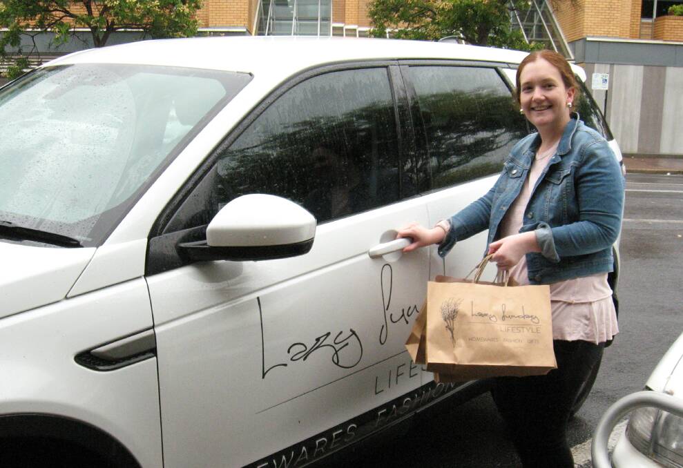 Change: Lazy Sunday Lifestyle owner Kate Griffiths sets out to deliver orders from her store, temporarily an online-only business because of coronavirus. Photo: FAYE WHEELER