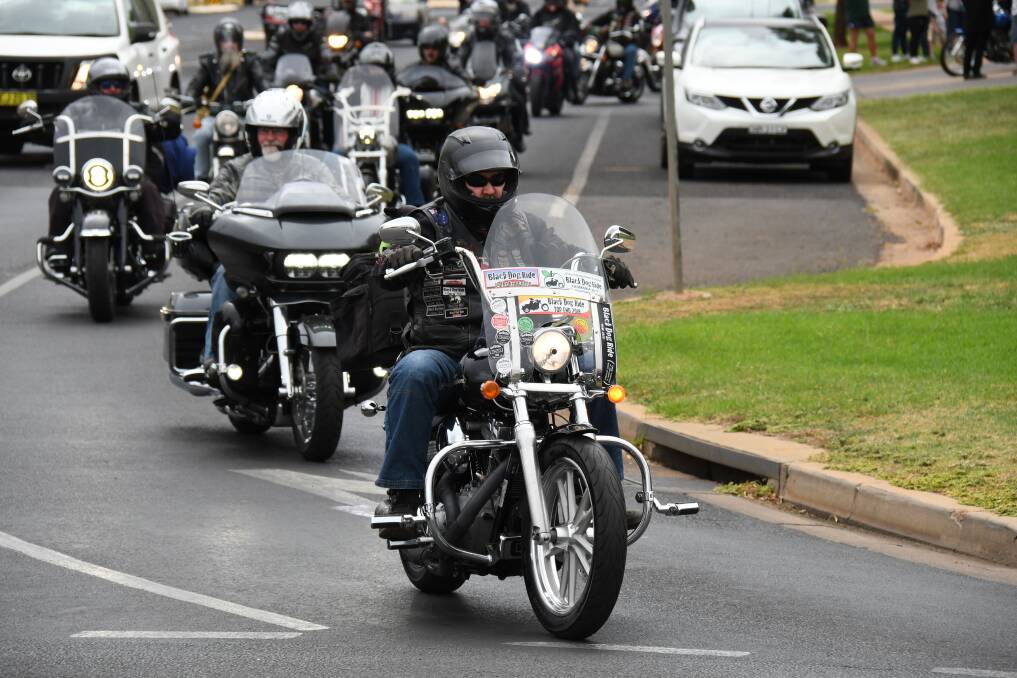 In solidarity: Black Dog Ride 1 Dayer organiser Wayne Amor leads participants through Dubbo in an event aiming to start conversations. Photo: AMY MCINYTRE