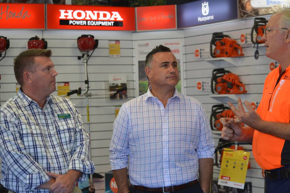 Nationals candidate for Dubbo Dugald Saunders and Deputy Premier John Barilaro meet with Rod Irwin at Wellington last month. Photo: DANIEL SHIRKIE