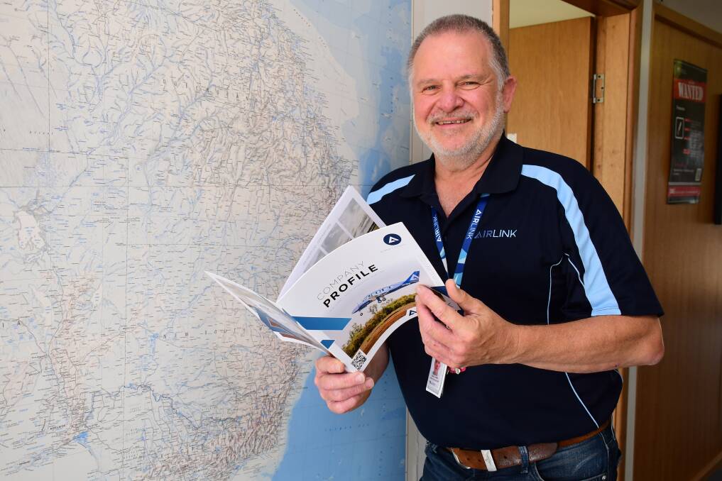 Growth: Air Link general manager Ron O'Brien at his Dubbo headquarters. The airline's workforce has expanded to nine people in the past year. Photo: BELINDA SOOLE