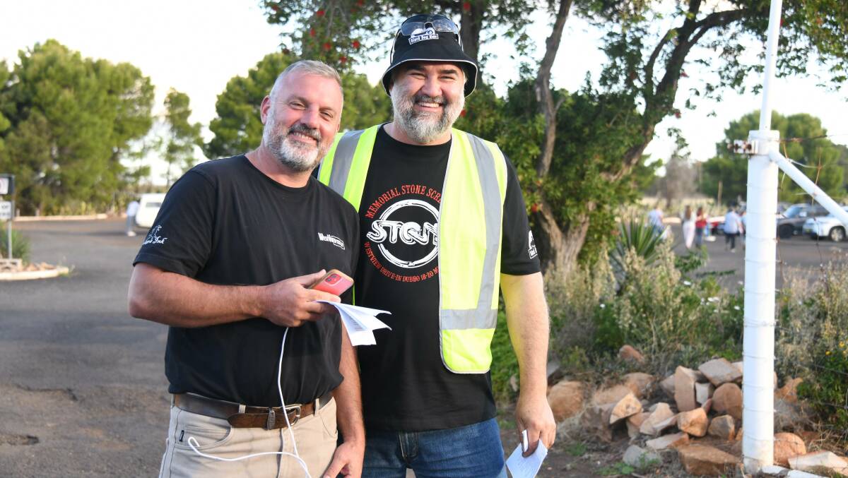 Dubbo Westview Drive-In operator Jason Yelverton, pictured with Wayne Amor at the final drive-in event, hopes to be able to save the screen and other equipment. Picture: AMY MCINTYRE