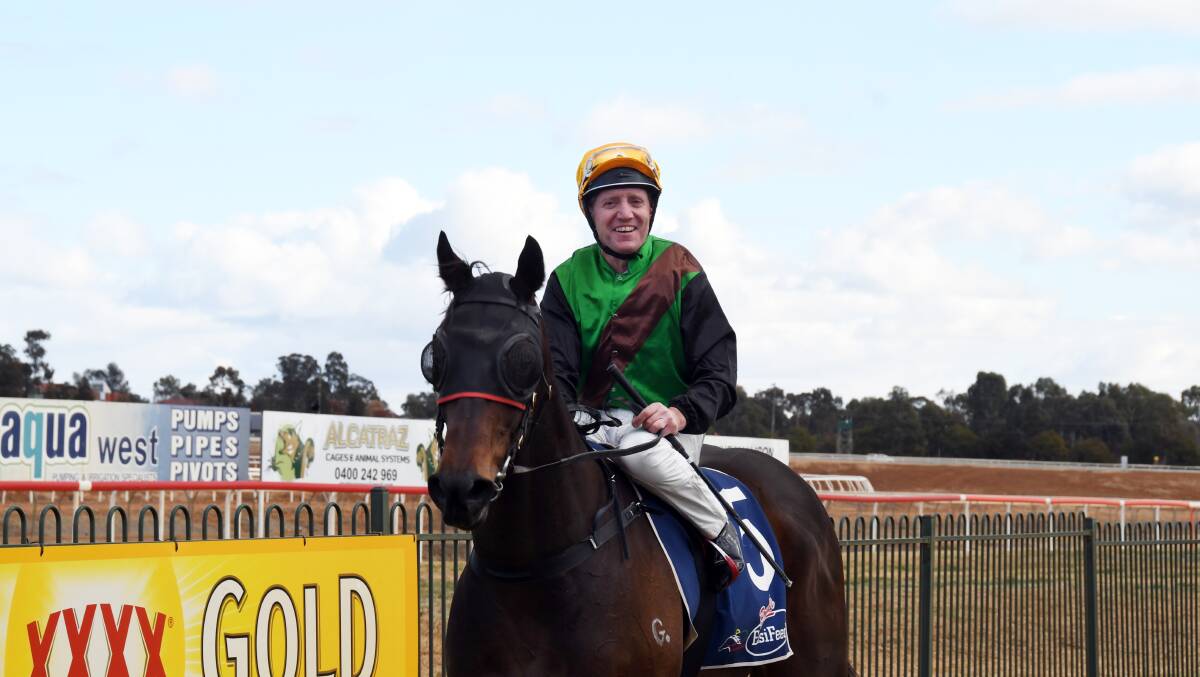 Jockey Ken Dunbar, pictured after a win in Dubbo, found success in Forbes. 