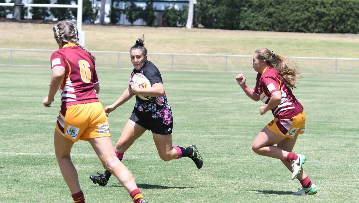 Leader: Amy Townsend playing against Woodbridge during last year's title-winning campaign for the Goannas. Photo: Belinda Soole. 