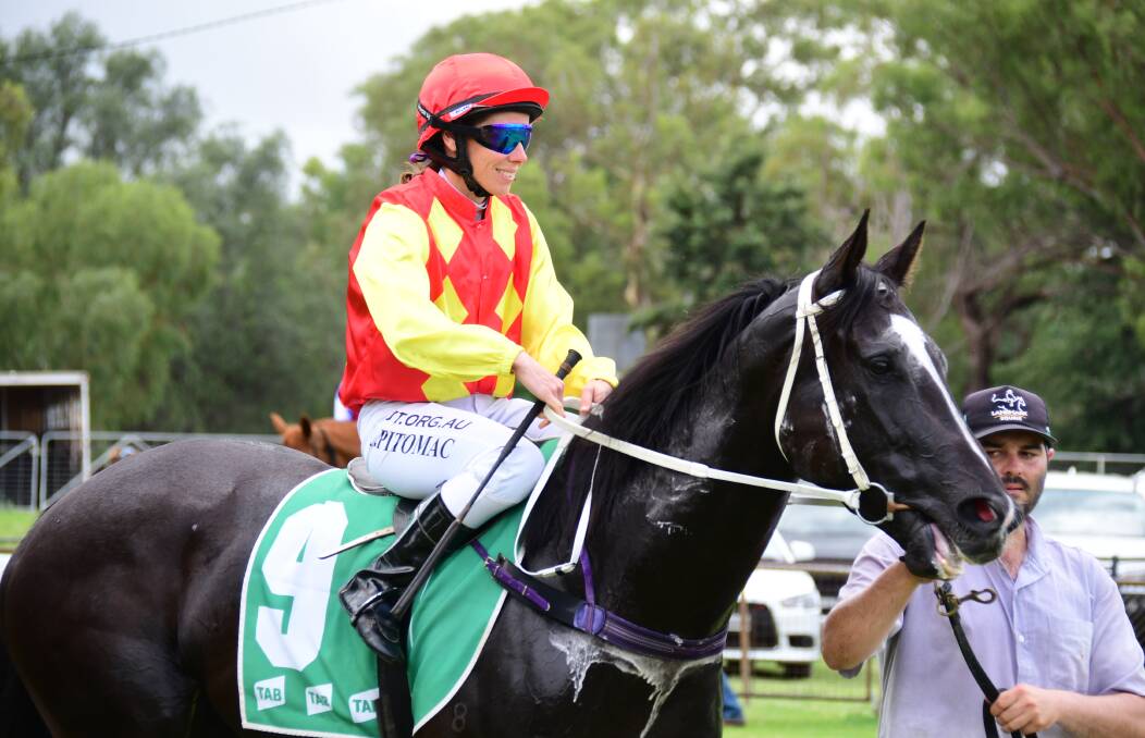 VICTORY: Gilgandra Cup winning jockey Kath Bell-Pitomac readies for the day's racing during an earlier fixture on Sunday. PHOTO: AMY MCINTYRE.