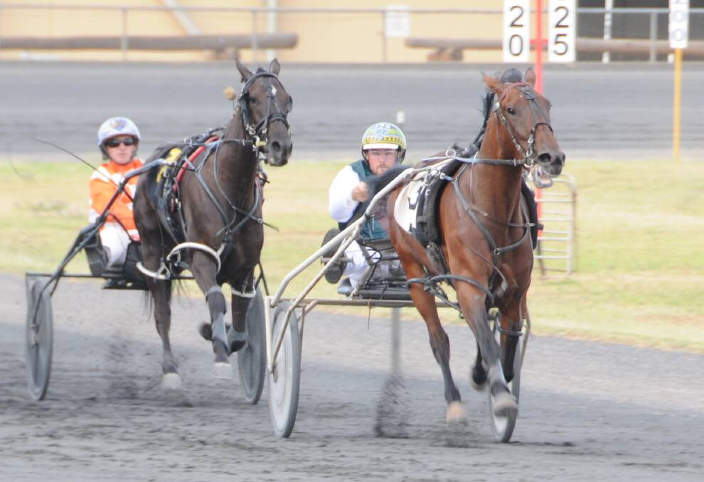 No More Woes: James Sutton and Kimsarme Direct (right) in action in their last win at Dubbo Paceway. Photo: Nick Guthrie.