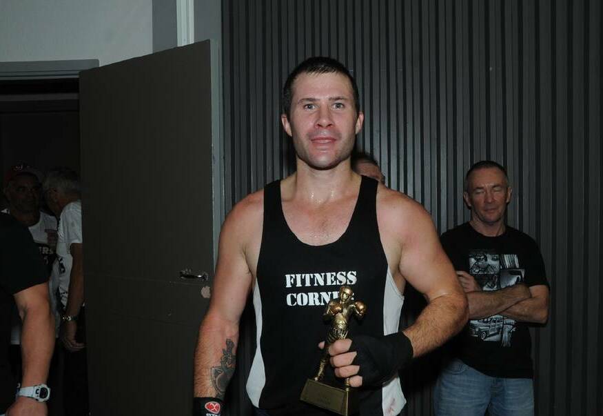 Fight of the Night: Adam Darlington, pictured after a past win, impressed at the recent event and will fight again soon in Moree. Photo: File.