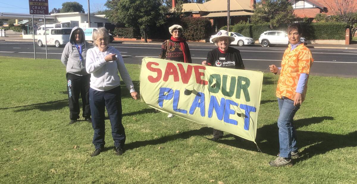Margaret MacDonald (right) led members of the Dubbo Environmental Group in a protest at Elton Park.