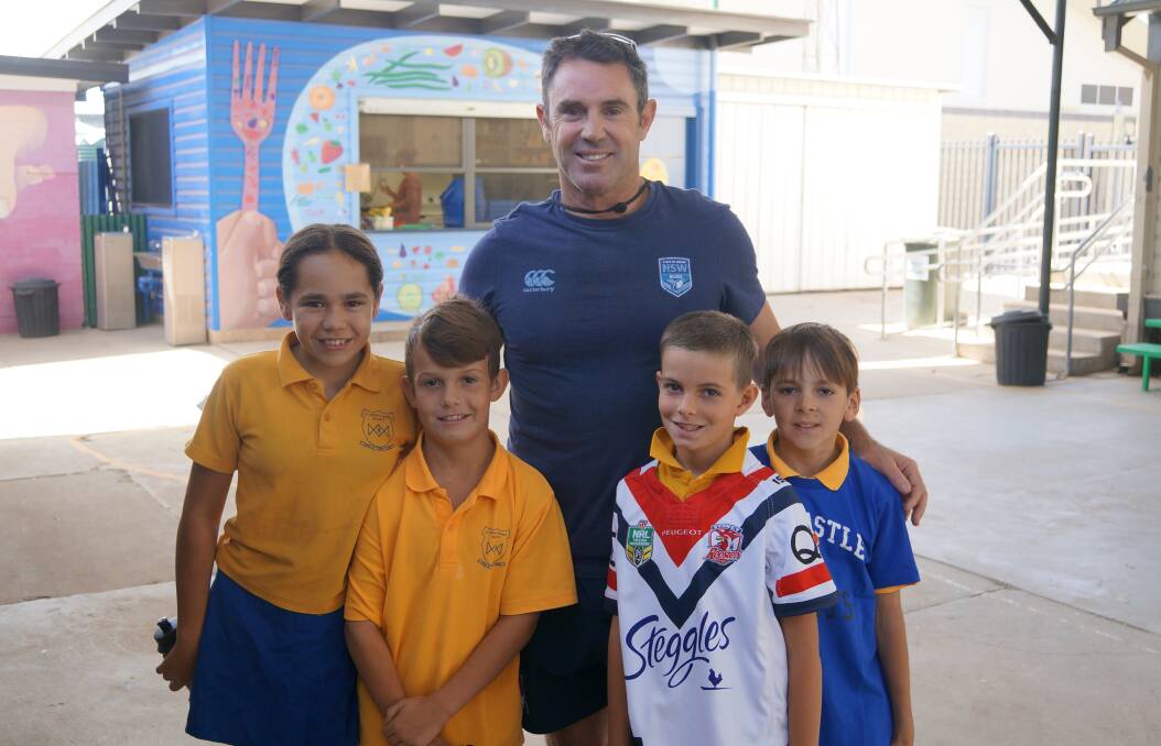 PASSING THROUGH: NSW Coach Brad Fittler with students at St Joseph's Primary School in Walgett. PHOTO: NSWRL.