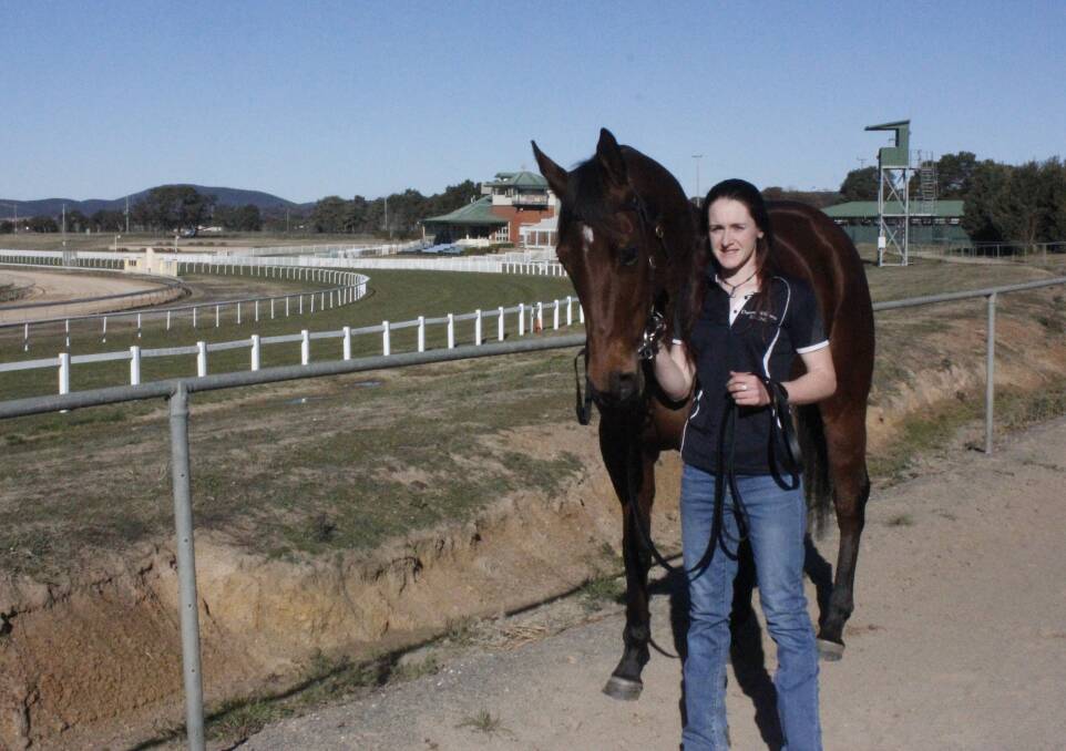 FAMILY: Jockey Angela Cooper, pictured here at the Goulburn track where she trained for her first win, picked up another meaningful victory on Monday. Photo: Burney Wong.