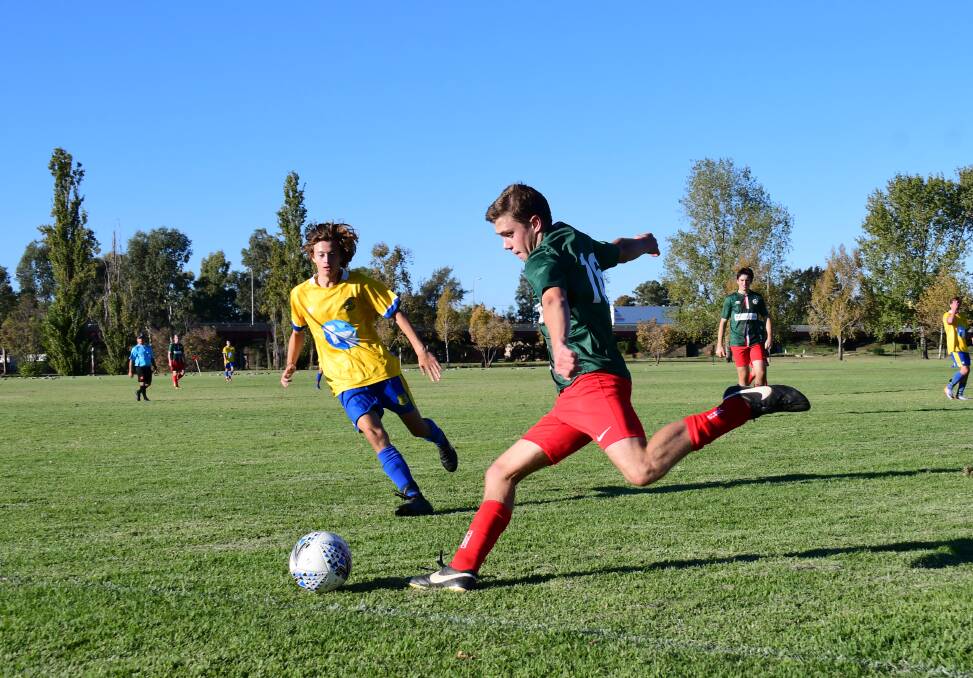 STILL WAITING: Westside's Will Olney sends the ball up-field during a match with the South Dubbo Wanderers last year. PHOTO: AMY MCINTYRE.