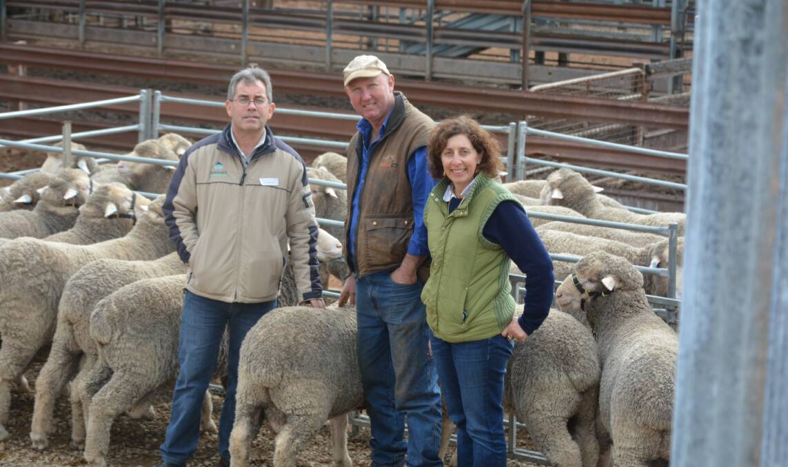 Farming Revolution : Dubbo's Mark Gardner (left) with Dripstone farmers Scott and Anna Brien. Photo: Farren Hotham.