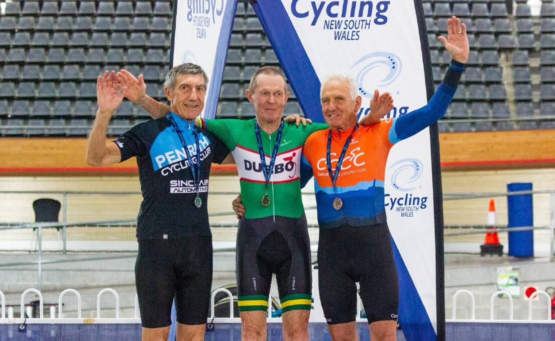 THE MASTER: Darrell Wheeler takes centre stage on the podium after setting another Australian record during the Masters Championships. 
