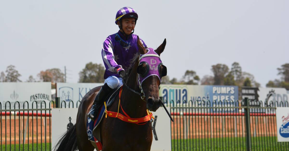BREAKOUT STAR: Qin Yong brings Drusilla in for placing at Dubbo on Monday in his final win of a sensational year. 