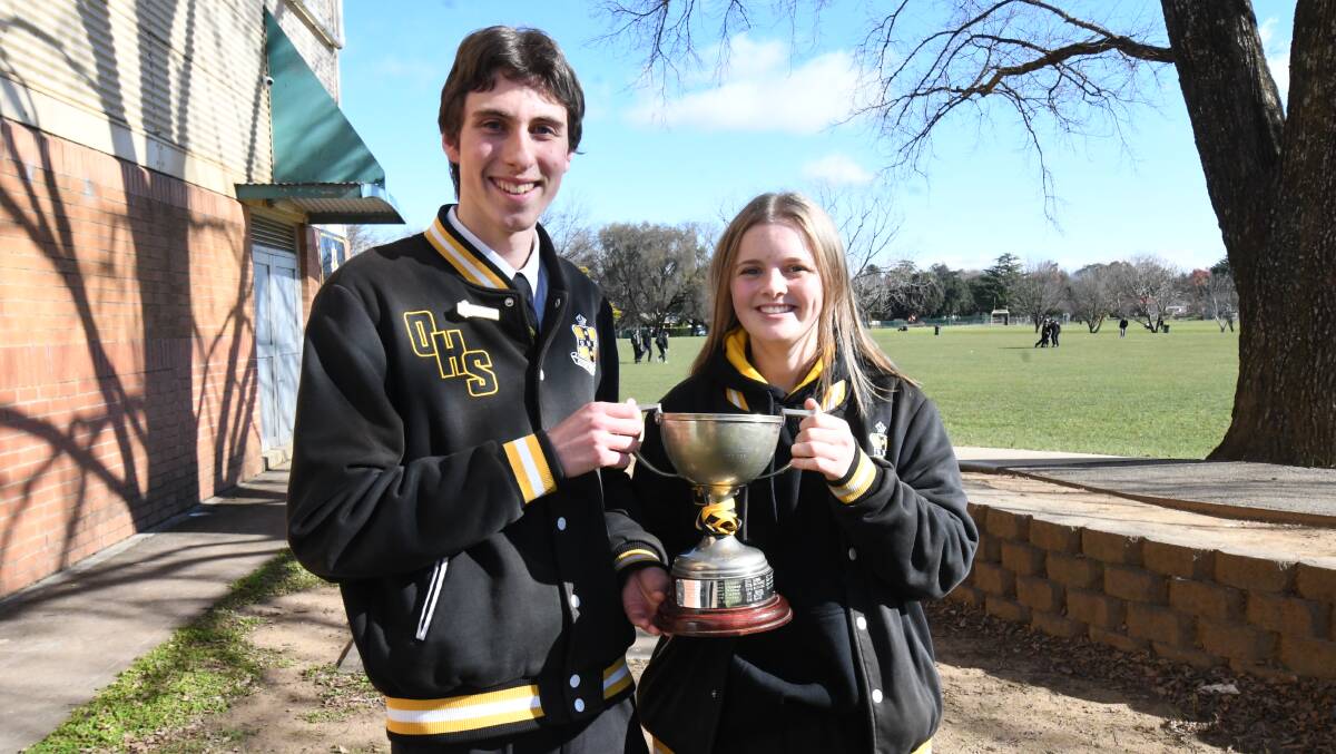 Orange High School captains Andreas Kuegler and Ella Lamrock with the 99-year-old Astley Cup. Picture: Carla Freedman