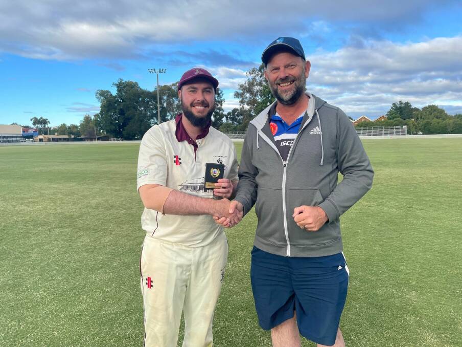 John Warrington with his player of the match award and BOIDC president Mark Frecklington. Picture by Lachlan Harper 