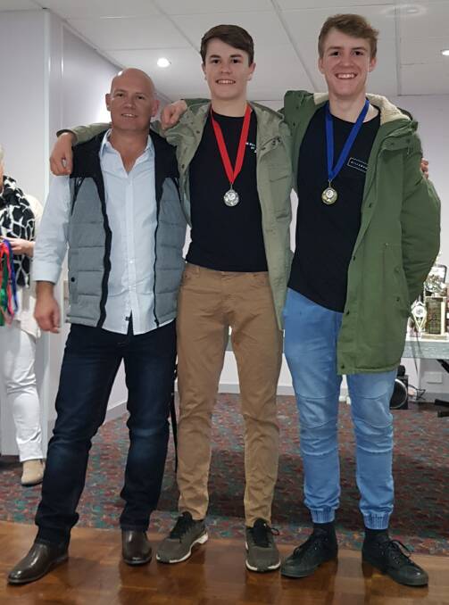 Vaughan Eather with Australian under 17 sprint champion Danny Barber and overall under 17 club champion and young rider of the year Dylan Eather. Photo: SUPPLIED