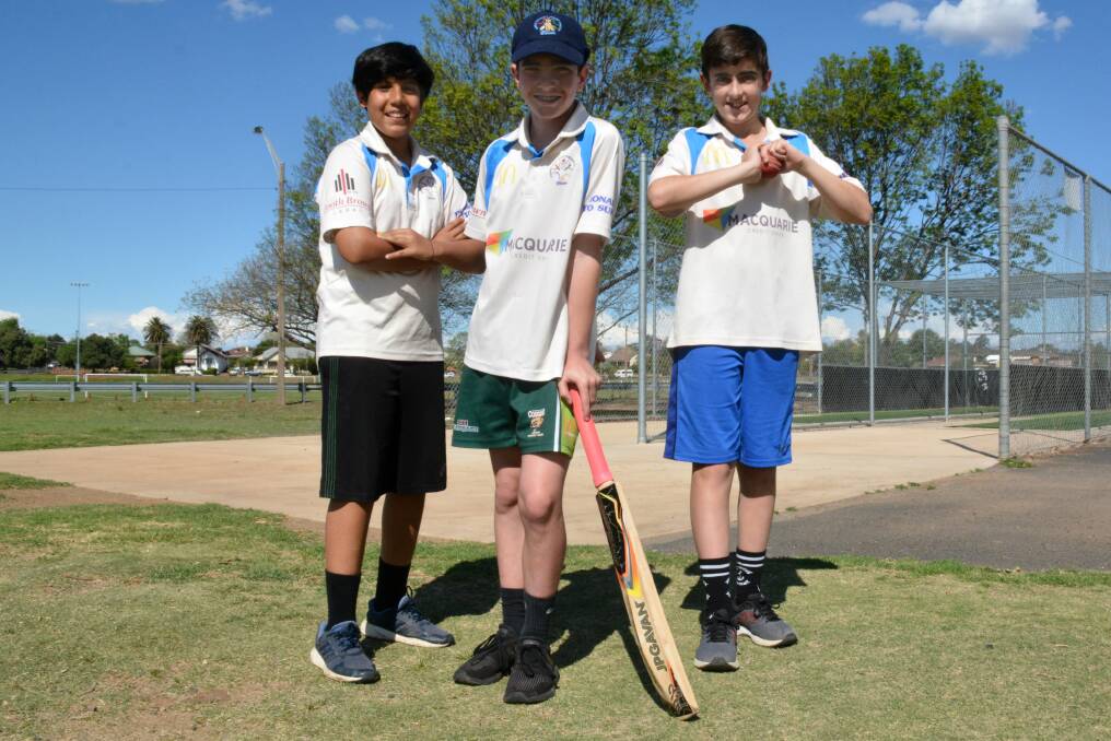 KEEN: Affan Sagri and Blake Smith (Dubbo White) with Lochie Rummans (Dubbo Blue) are excited to play lots of cricket this week.