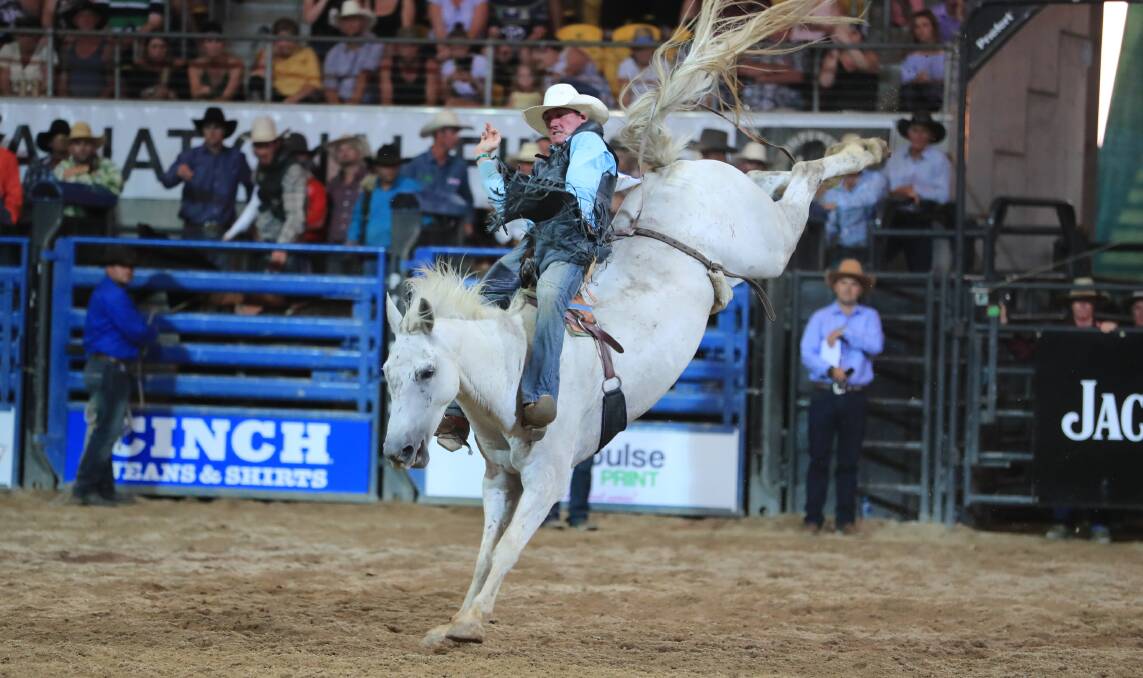 CHAMPION: Travis Wheatley in action in the Bareback Bronc event. Photo: JODIE ADAMS PHOTOGRAPHY