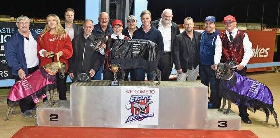 IN WINNING FORM: Charmaine Roberts and Caitlyn Keeping (centre) at the Ladbrokes Gardens track where they won the Sires on Black Top Final last week. Photo: VICKI MCINTOSH