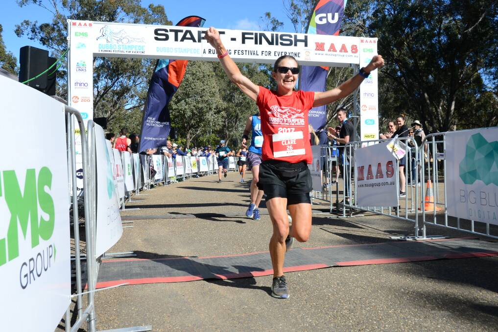 WINNER: Clare Palmer's grin said it all as she crossed the finish line on Sunday. Photo: PAIGE WILLIAMS