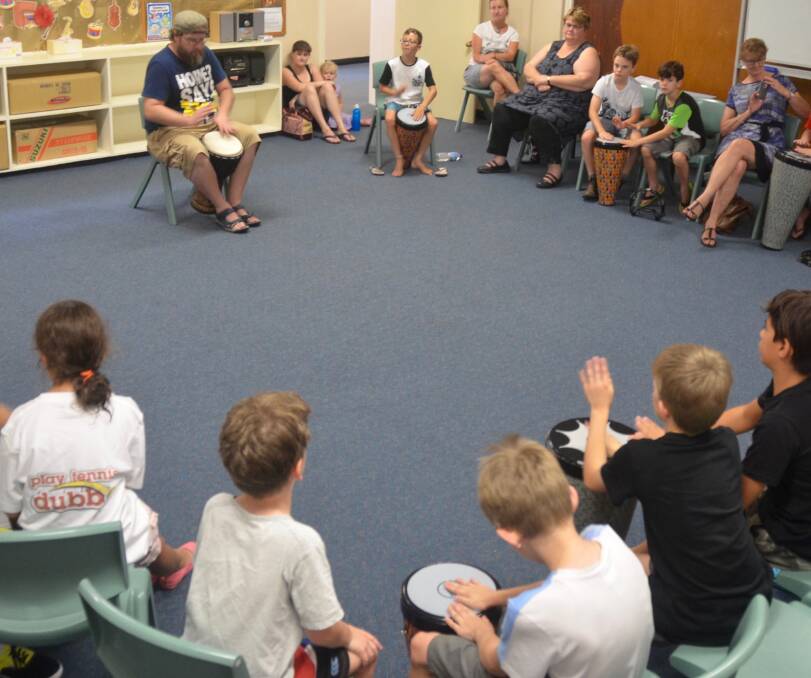 FEELING THE RHYTHM: Drumming workshops are a great way for kids to work off some energy in a nice cool environment. Photo: CONTRIBUTED