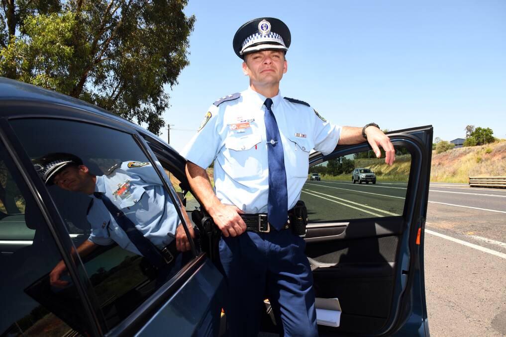 TAKE CARE: Traffic and Highway Patrol Inspector Ben Macfarlane. Photo: BELINDA SOOLE