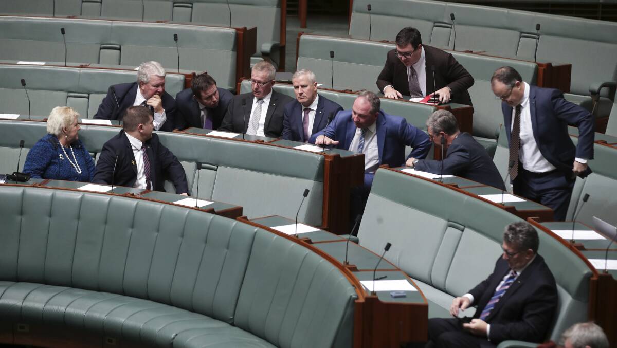The Nationals, including Mark Coulton (middle row, third from left), looked dejected on the floor of Parliament on Thursday. Photo: ALEX ELLINGHAUSEN