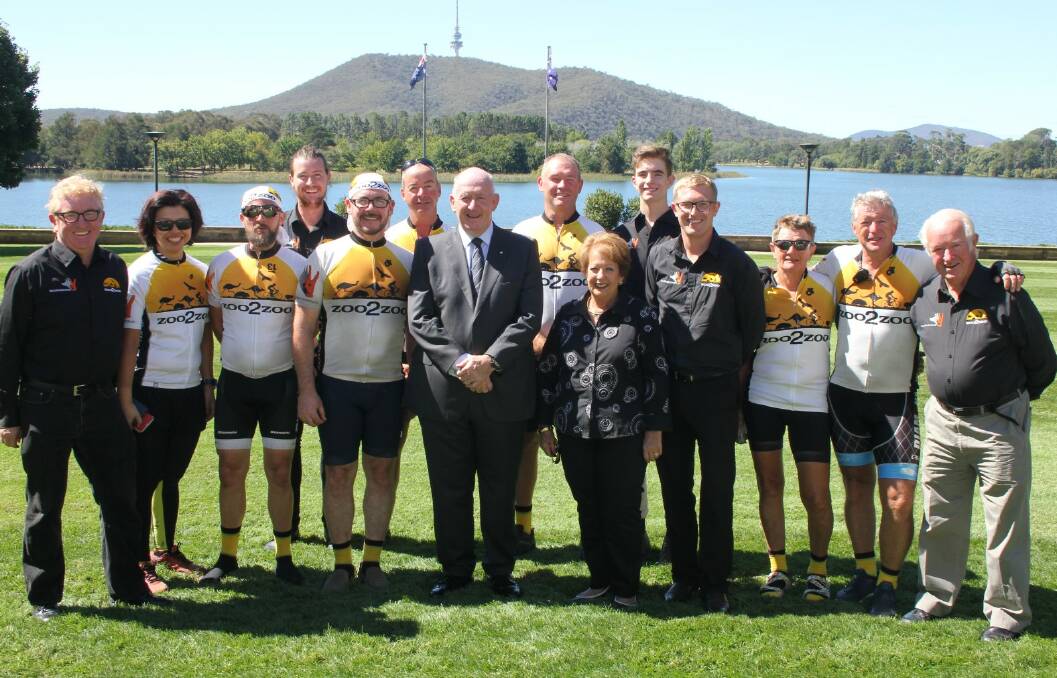HONOURED: Andrew (far left) and Ritchie (far right) McKay and Zoo2Zoo riders with Their Excellencies, The Governor-General Sir Peter Cosgrove and Lady Lynne Cosgrove. Photo: FIONA HARTLEY