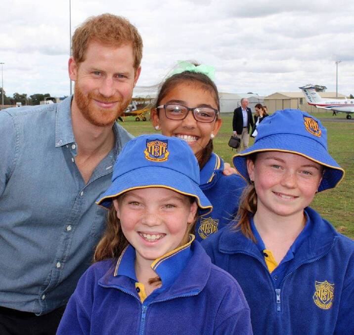 Prince Harry with Millie Sutcliffe, Ava Hosking and Amy Quilte (front). Photo: CONTRIBUTED