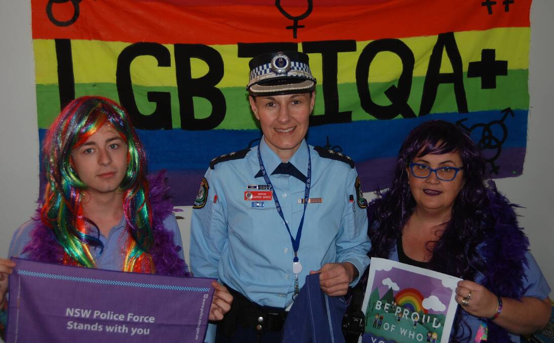 Be proud: headspace Dubbo's Nicolas Steepe and Rachel Thomas and NSW Police western region sponsor for sexual and gender diversity Inspector Gemini Bakos are urging people to Wear it Purple on Friday. Photo: GRACE RYAN