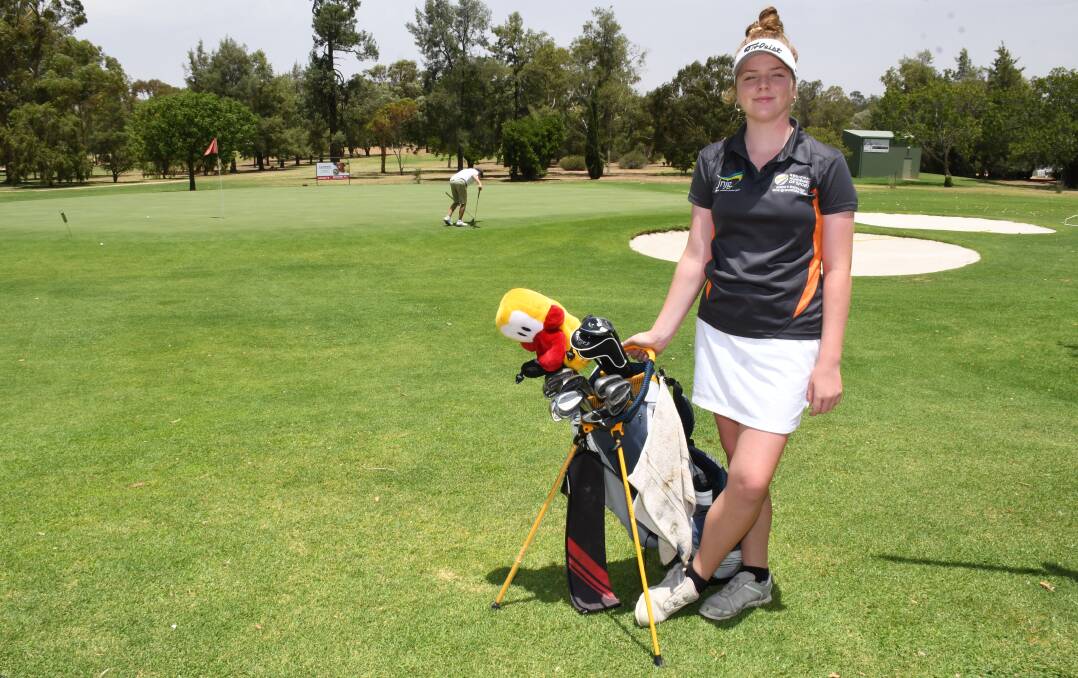 SOAKING IT IN: Ella Murray has proved herself a quiet but dedicated student during Tuesday's practice rounds at Coolangatta Tweed Heads Golf Club. Photo: AMY MCINTYRE