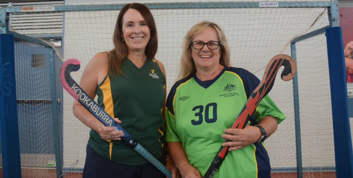 TEAMMATES: Tracey Hardie-Jones (shadow) and Helen McGee (keeper) train for the upcoming Indoor Hockey World Cup. Photo: JENNIFER HOAR
