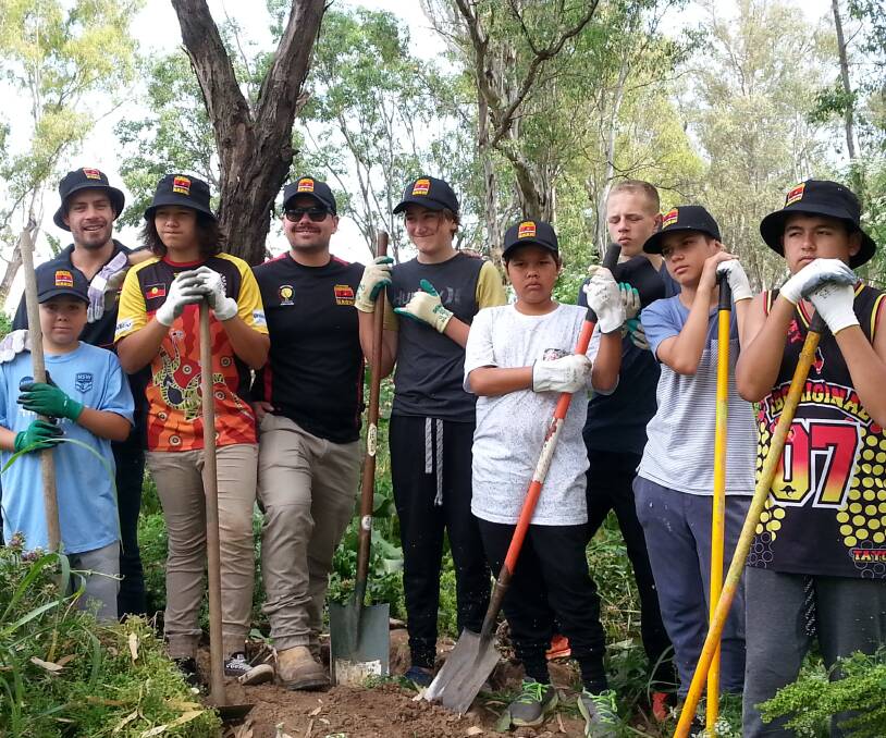 Lending a hand: Members of Dubbo College Delroy campus' Clontarf Academy at last month's working bee. Photo: JULIE MILLER