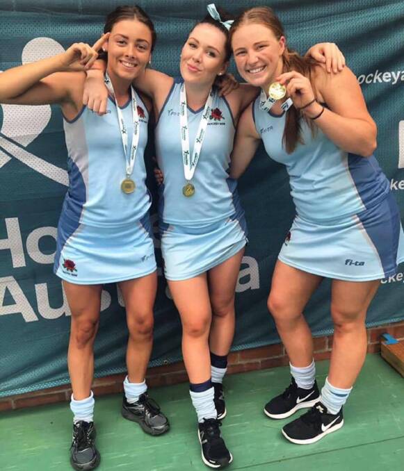 WINNERS: Emma Corcoran (centre) with roommate Chloe Barrett (right) and fellow Dubbo product Phoebe Bloink-Hollier at the 2017 under 18 Australian Indoor Championships. Photo: SUPPLIED