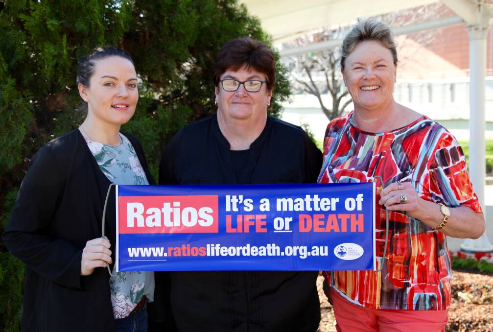 Lauren Lye (NSW Nurses and Midwives’ Association Dubbo Base Hospital branch Secretary) with fellow Dubbo nurses Kelly Crosby and Lynne Mackander. Photo: SUPPLIED
