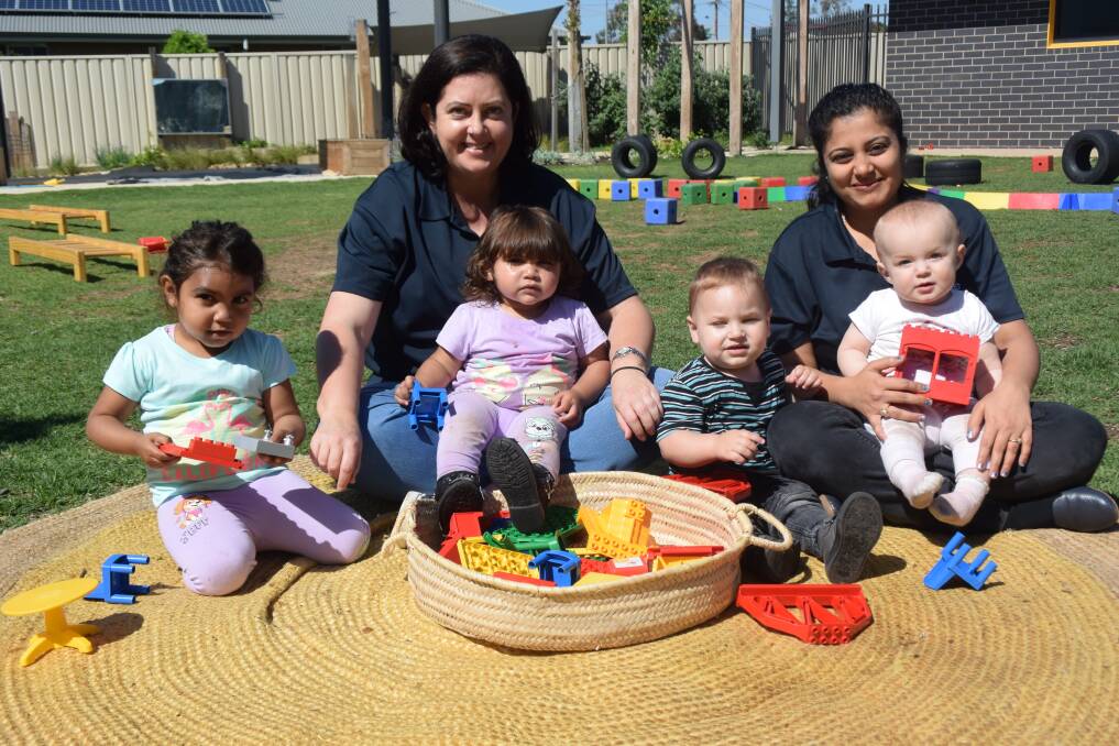 Always improving: Dubbo Early Education & Care Centre Manager Gemma Lavelle and Soniya Lakhani with Shirley, Jay, Heath and Lily. Photo: Monika Belfield.