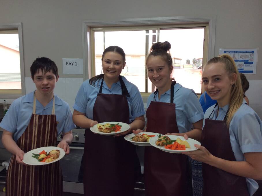 Cooking up a storm: Students are assisted to achieve everything they want in the classroom, on the sports field or in the kitchen. Photo: Supplied.