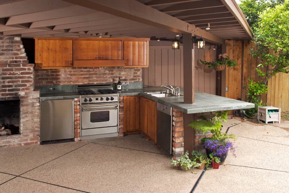 Cook up a storm: Outdoor kitchens are becoming more popular, allowing you to create the perfect meal while enjoying fresh air. Photo: Shutterstock.
