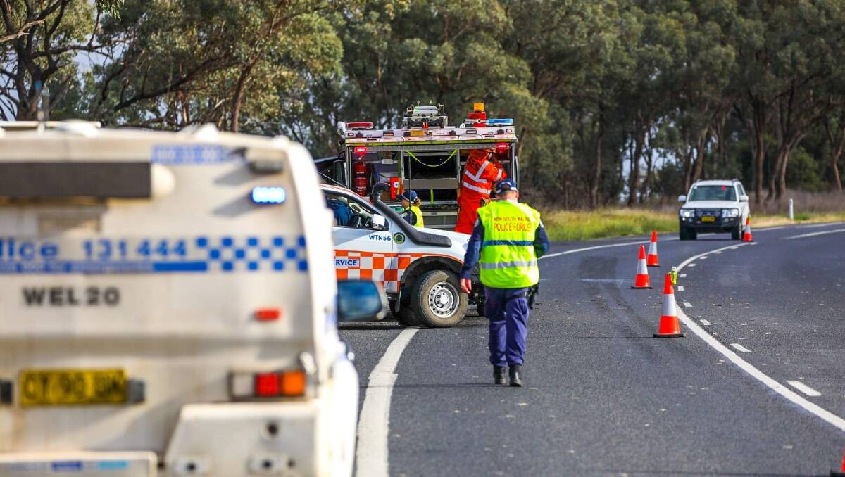 Police and other emergency services at the accident scene outside Wellington. PHOTO: TROY PEARSON