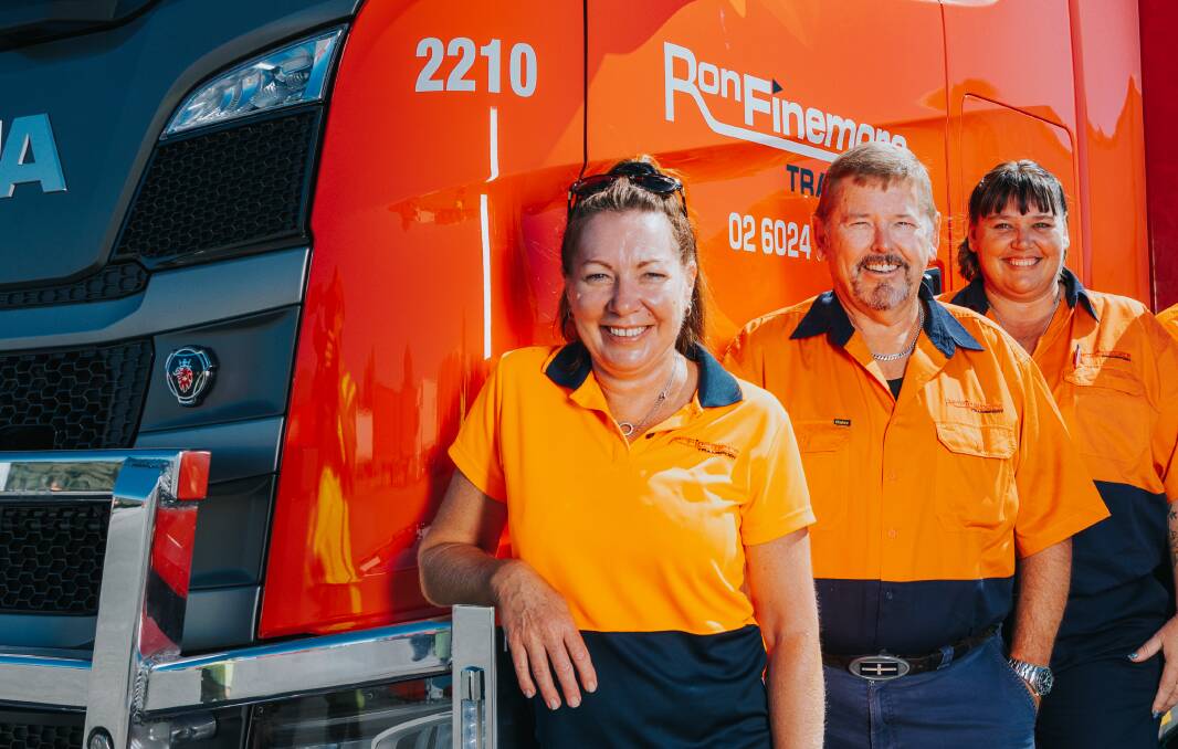Keeping Australia moving: Simon Laurence with fellow drivers Leanne Healy (left) and Andrea McGrath. 
