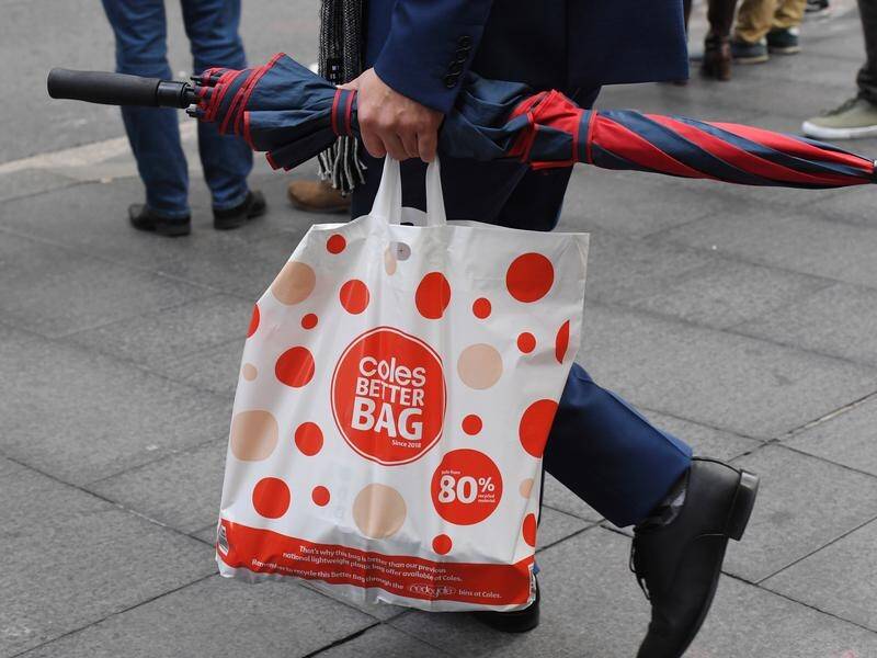 Coles has decided to continue giving away reusable plastic bags.