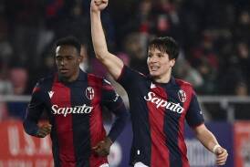 Giovanni Fabbian celebrates after scoring Bologna's opener in the 2-0 Serie A win over Torino. (AP PHOTO)