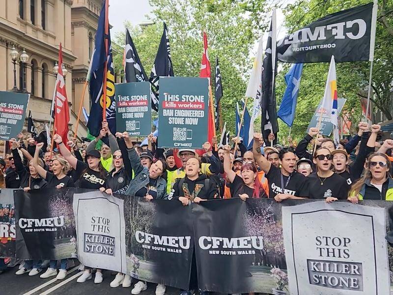 Unions are threatening to enforce their own bans on worksites if engineered stone laws don't change. (Luke Costin/AAP PHOTOS)