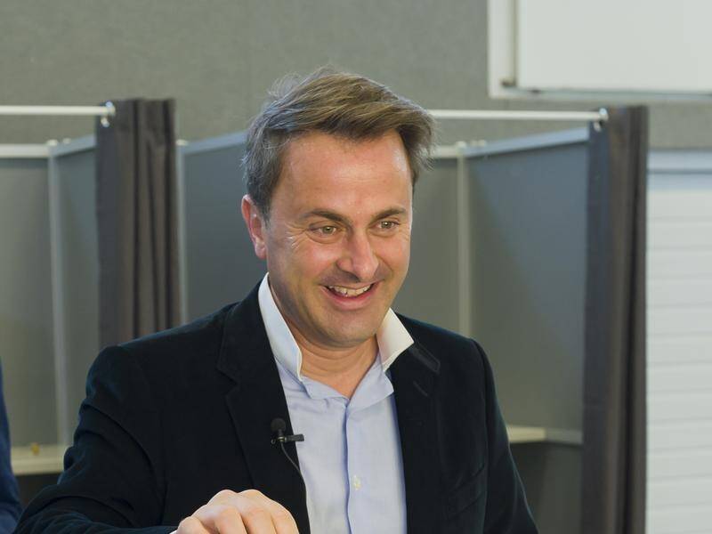 Luxembourg Prime Minister Xavier Bettel casts his vote.