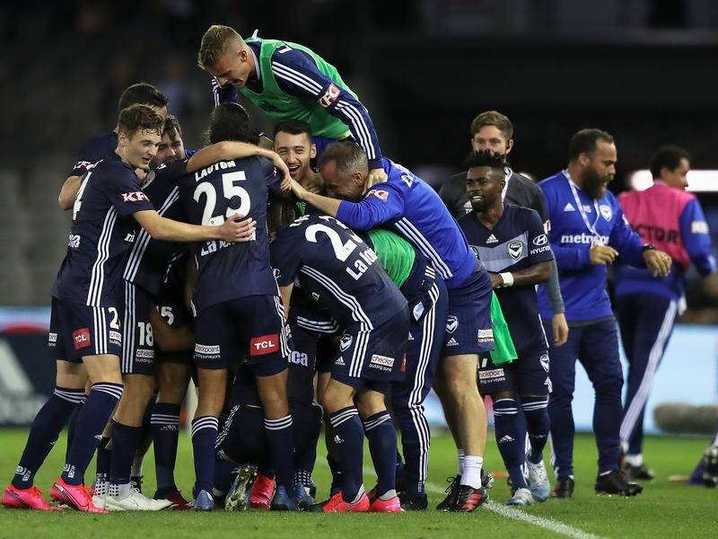 An Andrew Nabbout injury-time goal has given Melbourne Victory a 2-1 A-League win over Adelaide Utd.