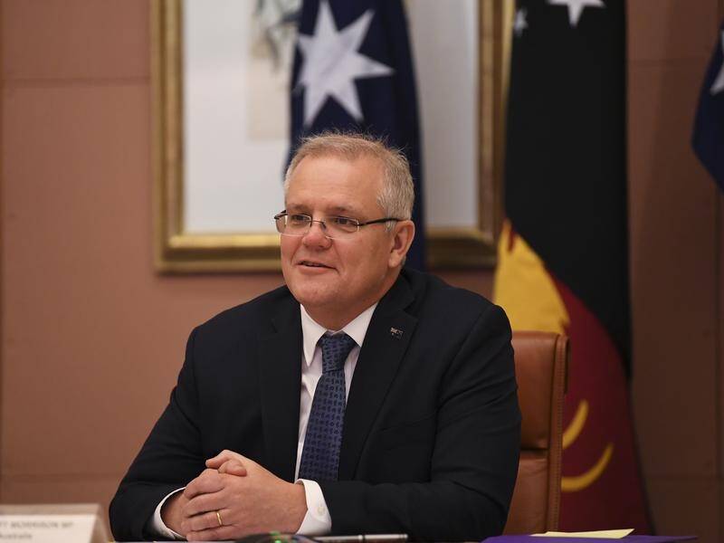 Scott Morrison and PNG leader James Marape have used a virtual meeting to agree a $580m port deal.