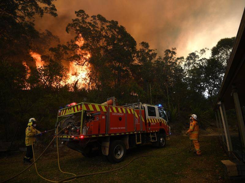 A 250,000-hectare bushfire at Gospers Mountain northwest of Sydney has joined two other blazes.