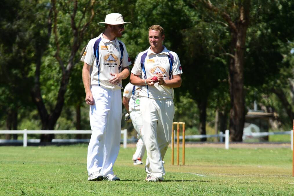Greg Buckley (right) pictured with Dubbo skipper Mitch Bower, hopes to be back in Australia for the start of next season. 	Photo: BELINDA SOOLE