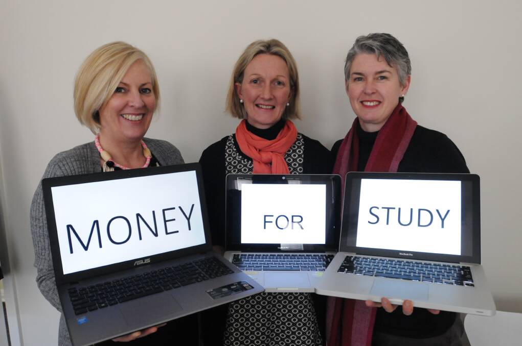 The Country Education Foundation's Sarah Taylor, Amanda Waterman and Lisa O'Connor are helping regional students access financial help for university. 														  Photo: STEVE GOSCH